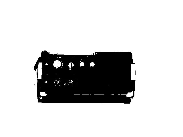 An apparatus sitting on a shelf with knobs and dials and a built-in TV screen