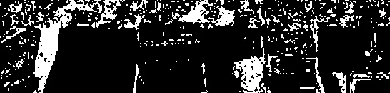a data-moshed image that mostly looks like black and green noise