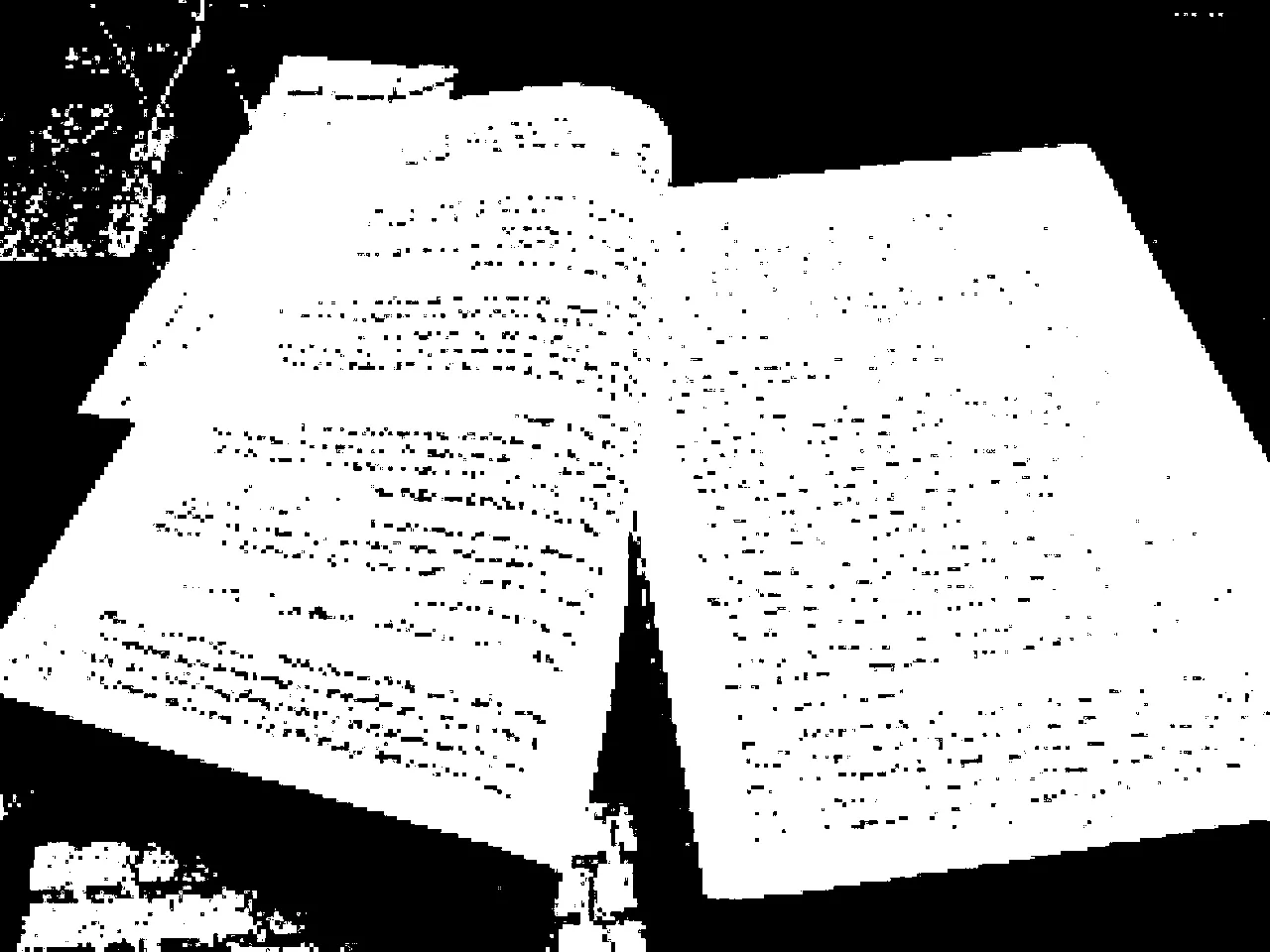 obfuscated document on a desk