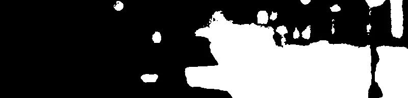 Out-of-focus picture of some fire trucks in an alley, taken from my roof