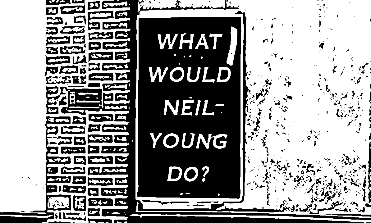 A poster on a building that says, "WHAT WOULD NEIL YOUNG DO?"