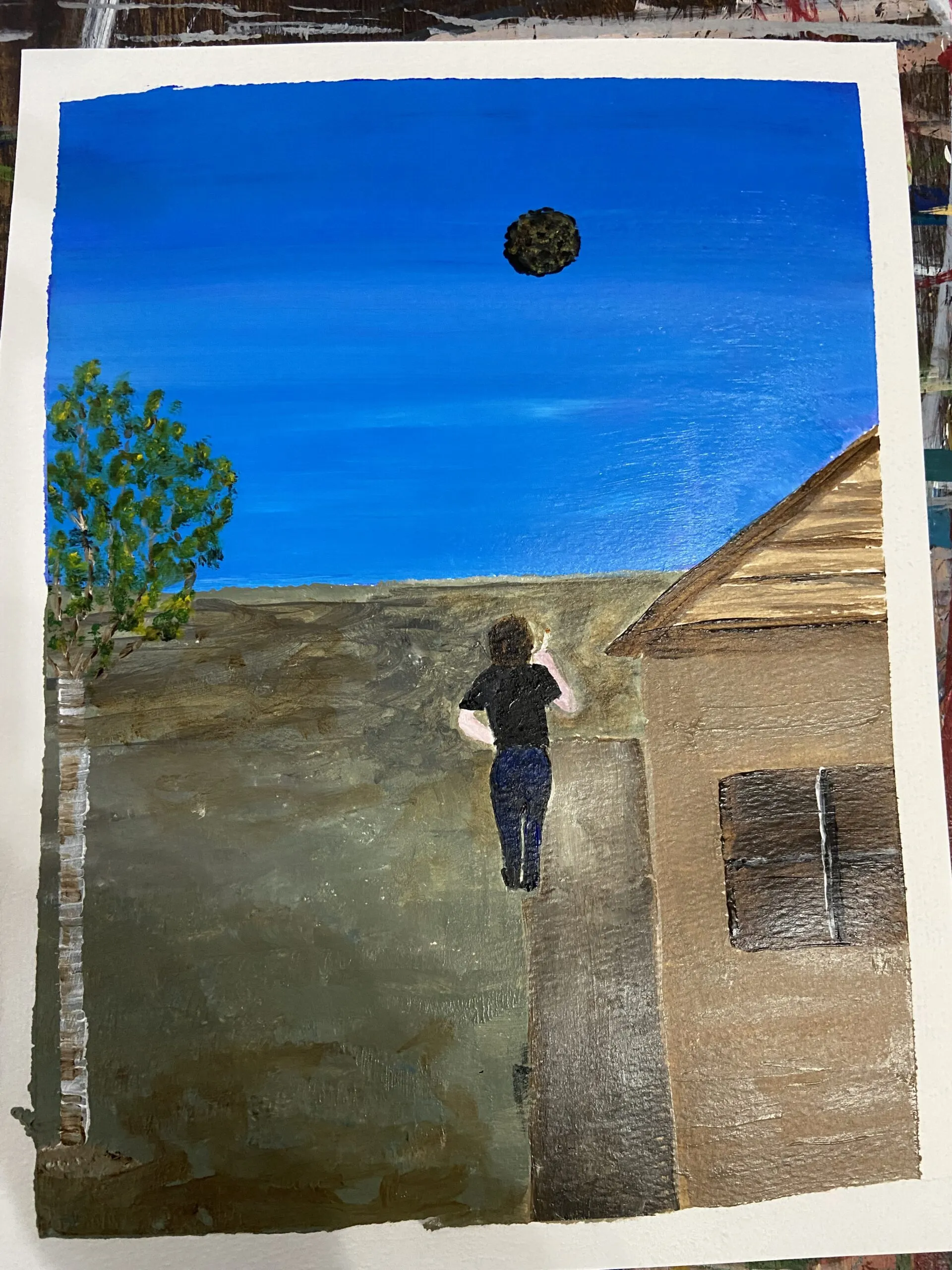 An amateur-ish painting of the artist's UFO sighting. The artist depicts themself standing outside their workplace for a smoke break and seeing a bumpy orb in the sky.