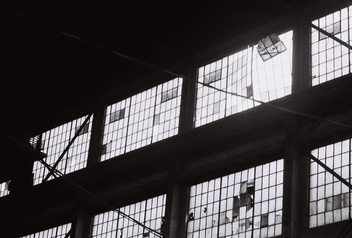 light coming through the windows of a warehouse