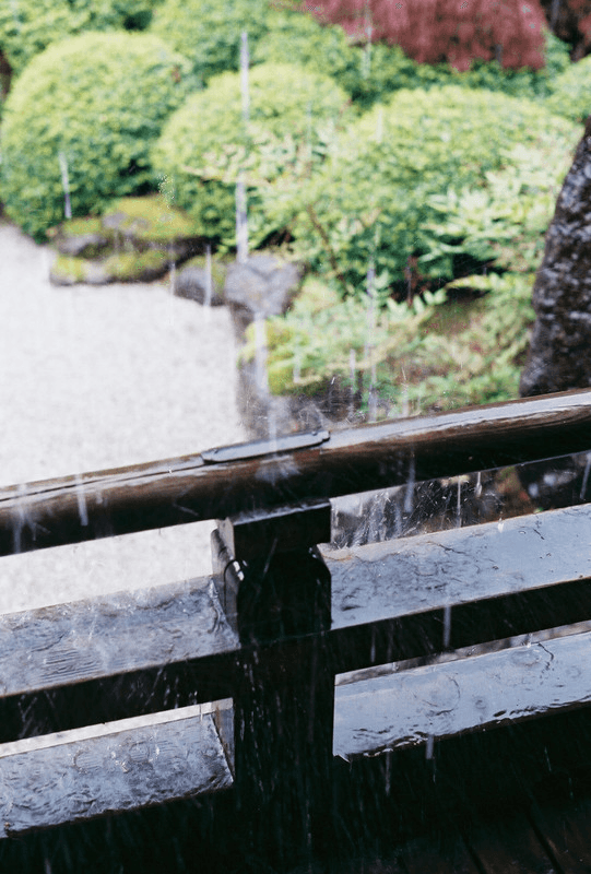 rain falling on a banister